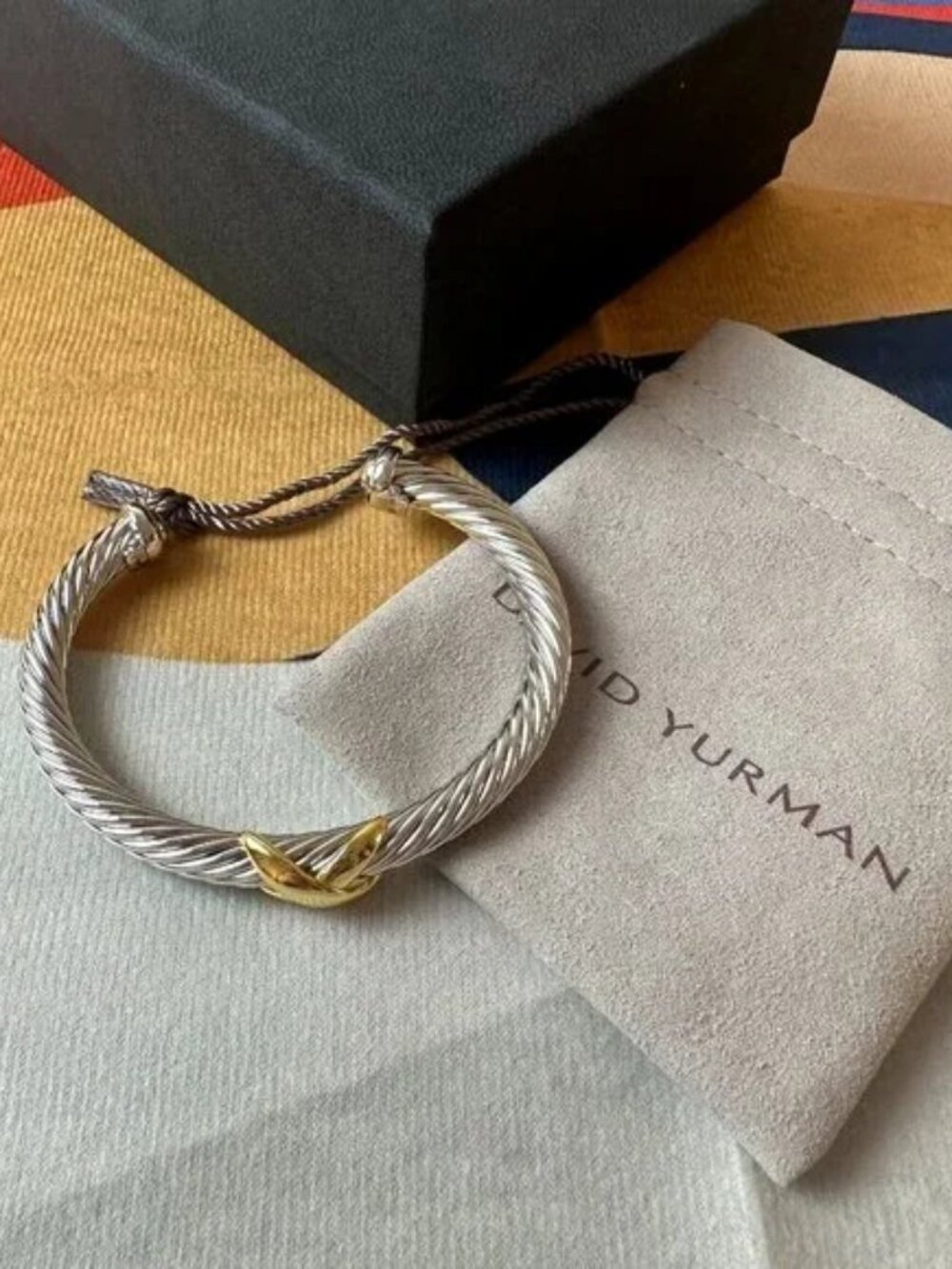 David Yurman's bracelet with a cross motif